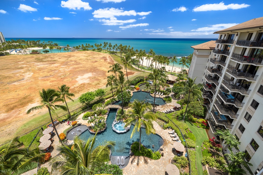 Tropical paradise with pristine beach, crystal-clear pools, and luxury beachfront accommodations creating the perfect Hawaiian getaway.