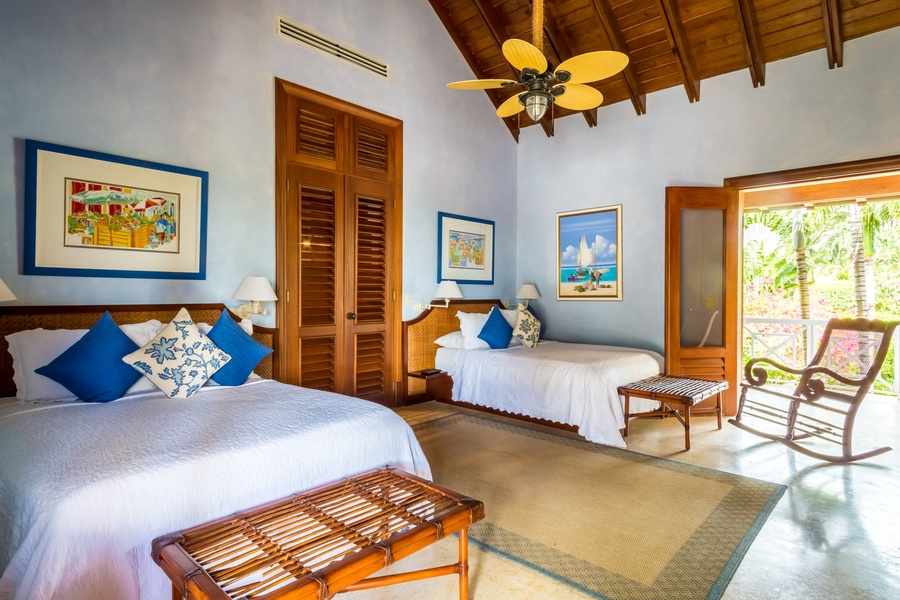 The guest bedroom has two double beds.