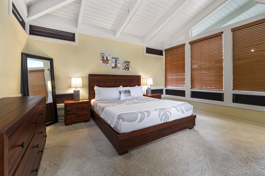 Guest bedroom 1 equipped with King bed, A/C, & TV