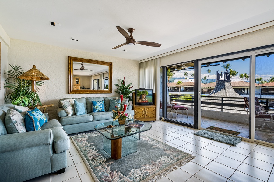 Tropically appointed living room with QUEEN SLEEPER SOFA!