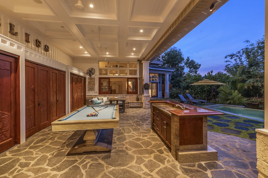 This area opens directly to the backyard with the private pool and hot tub