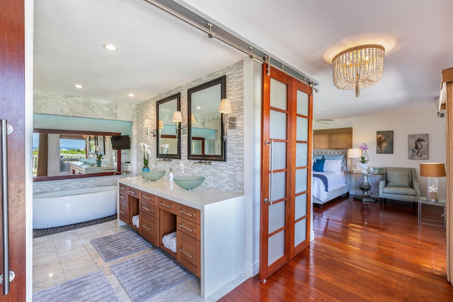 The ensuite bathroom has two vanity spaces and large soaking tub.