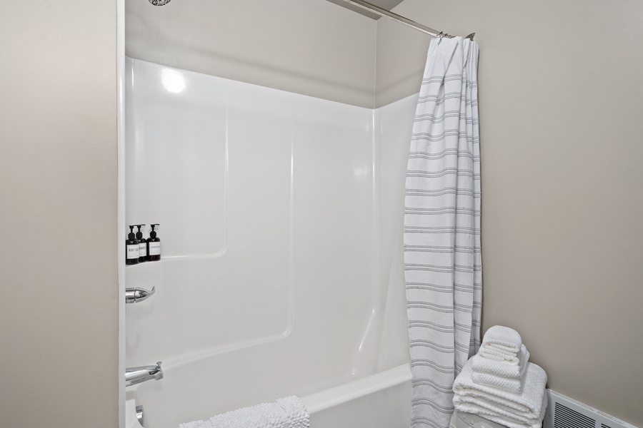 This combo tub and shower gives flexibility for baths or quick rinses.