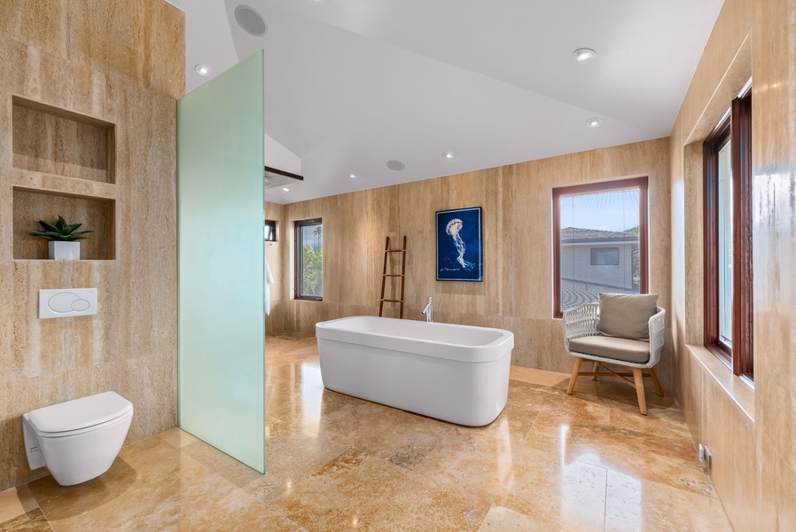 Spa-like experience on the ensuite bath featuring a large soaking tub.