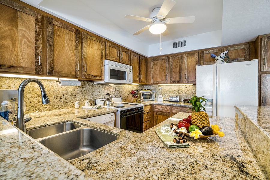 Fully equipped kitchen steps from outdoor dining!