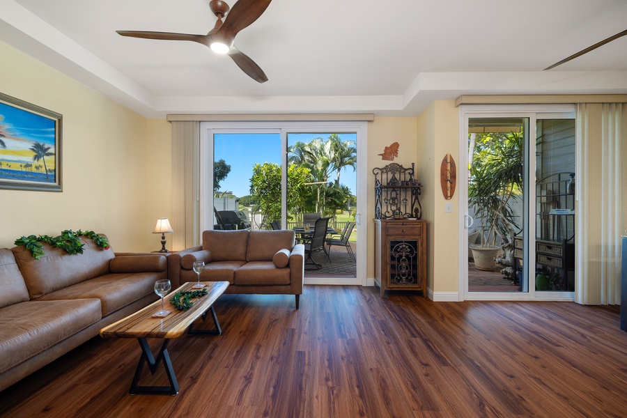 Unwind in the spacious living room with modern decor and warm tones.