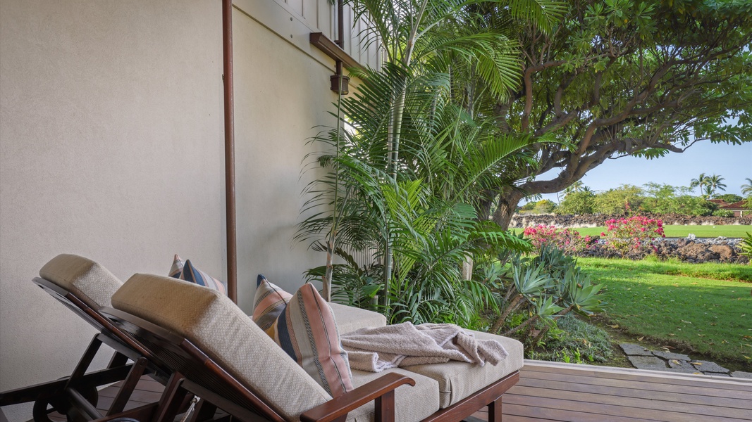 Relax on the private lanai with views of the golf course.