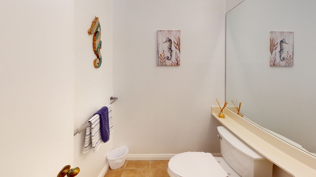 The second guest bathroom with sea life decor.