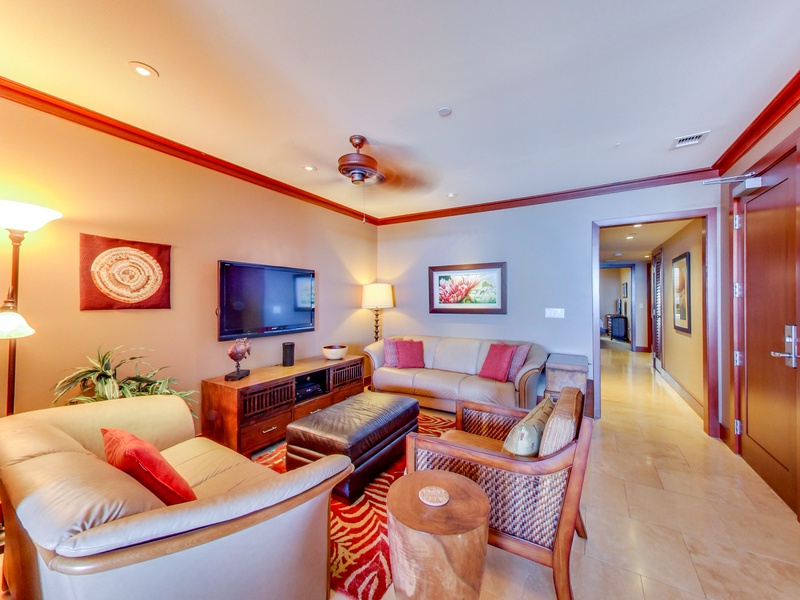 This tastefully decorated living area with vibrant colors will be your favorite spot.