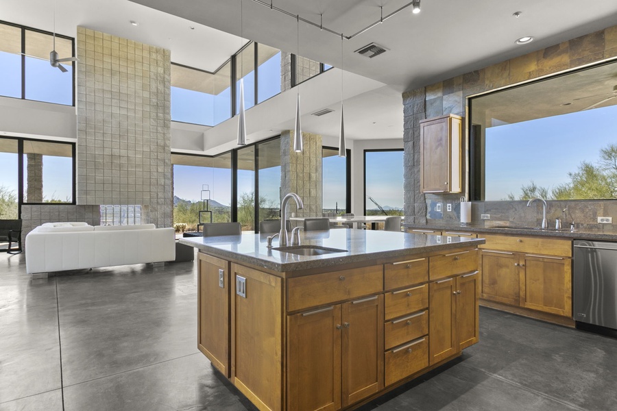 Modern kitchen with a spacious island, offering functionality and style in our home flooded with natural light.