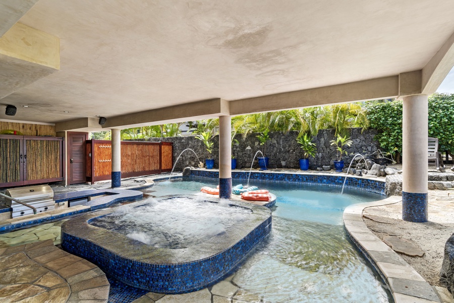 Integrated spa and swim-up bar zone—designed for entertaining and soaking in luxury.