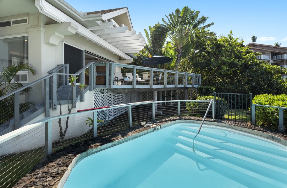 Looking back from the pool to the main home