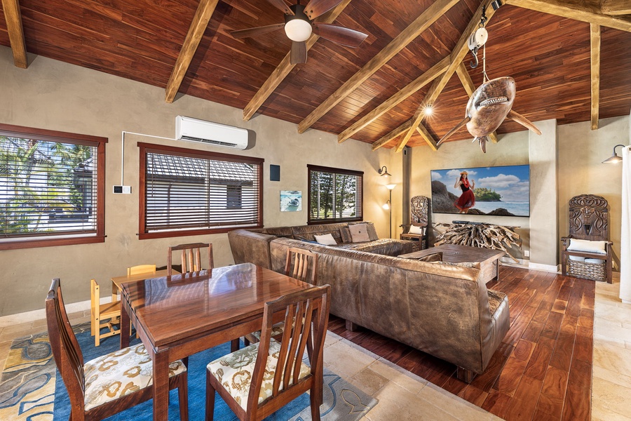 Spacious layout with game table and sectional seating—ideal for puzzles, cards, or family movie marathons.