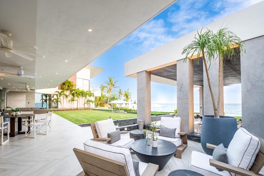 Unwind in this stylish open-air lounge area with plush seating, enjoying views of Dominican Republic.