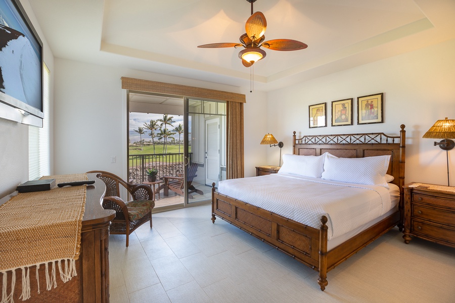 The primary suite features a king bed, a flat-screen television, a soaking tub, a large shower, and a dual-sink vanity, as well as a private lanai where you can sip your Kona coffee in the mornings