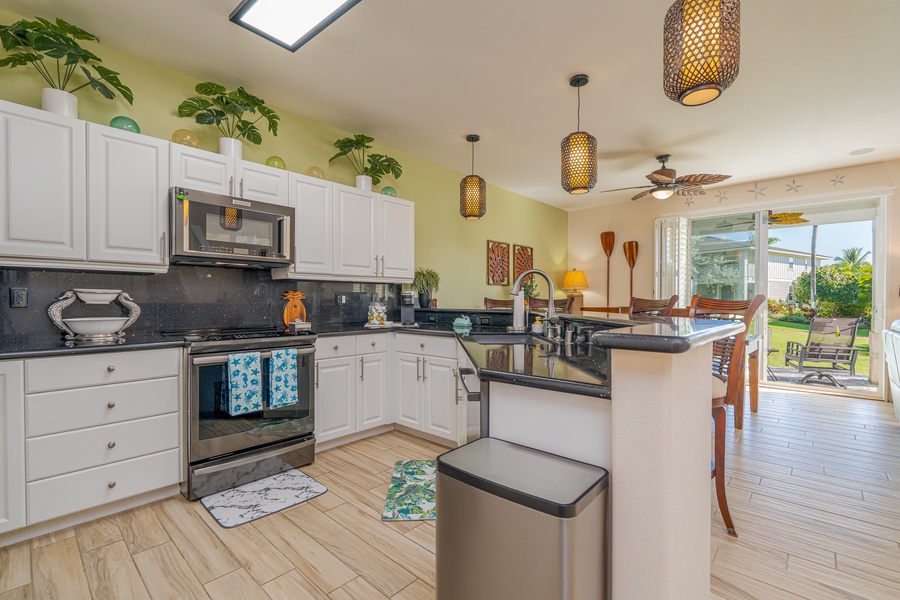 Fully-stocked and spacious kitchen area with wide counter space.