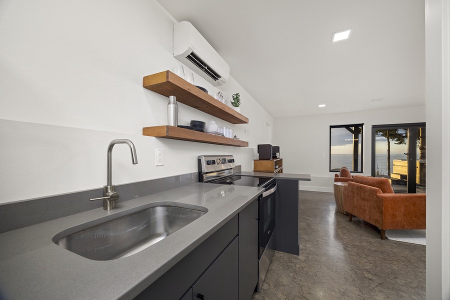 Additional kitchen area with sink and counter space — ideal for morning coffee or light snacks.