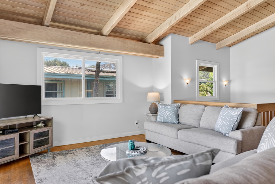 Stretch out in the cozy upstairs lounge with vaulted ceilings and soft natural light.