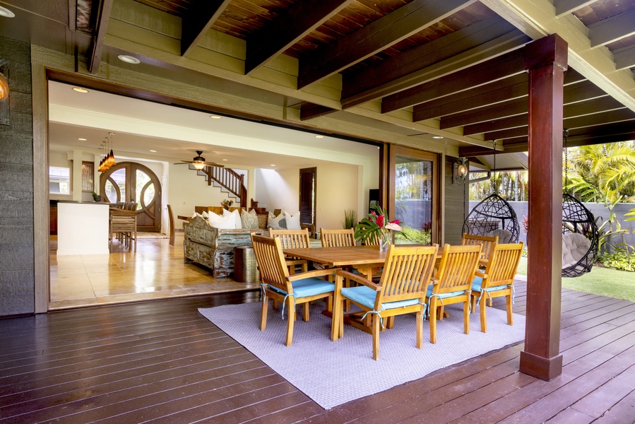 The spacious covered lanai has dining for eight and easy access to the kitchen.
