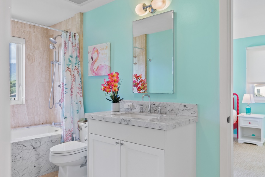 Jack-and-Jill bathroom with mountain views and whirlpool tub