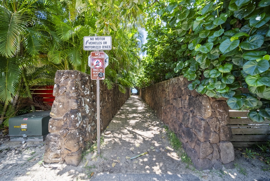 Pathway leading to Velzyland Beach—just a two-minute walk to sand and surf.