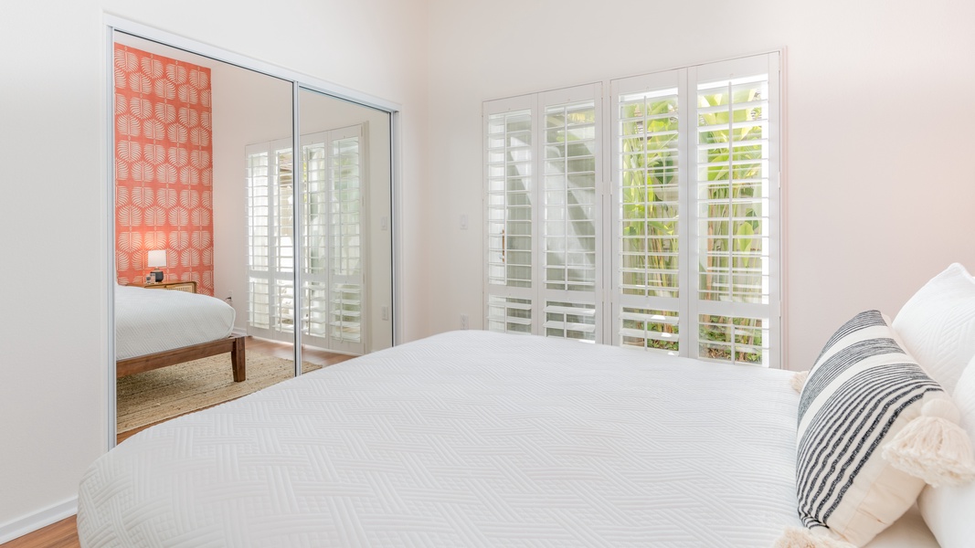 The downstairs guest bedroom with tropical views.