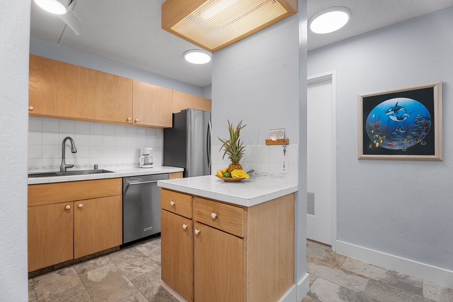 Compact kitchen island for meal preparation