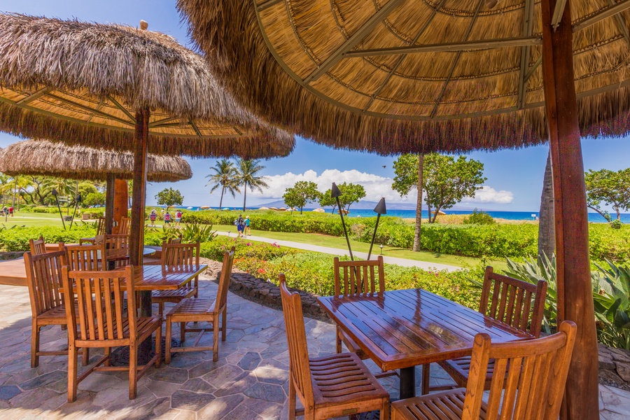 Shaded dining huts at the resort are perfect for a midday break or sunset meal