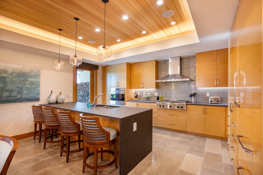 Wide and spacious kitchen with room for entertainment while crafting delightful meals.
