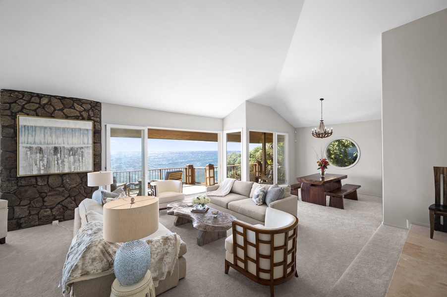 The large sliding glass doors of the main living area off of the kitchen to your private, ocean facing lanai brings the outdoors in, granting your guests stellar views, the soothing sounds of crashing waves