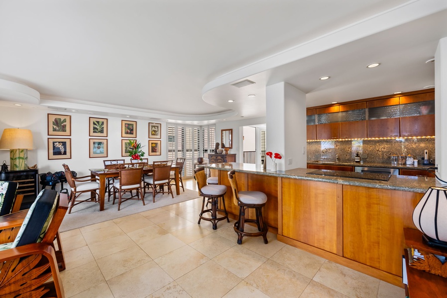 Spacious dining area and breakfast bar with open layout, great for entertaining or enjoying family meals