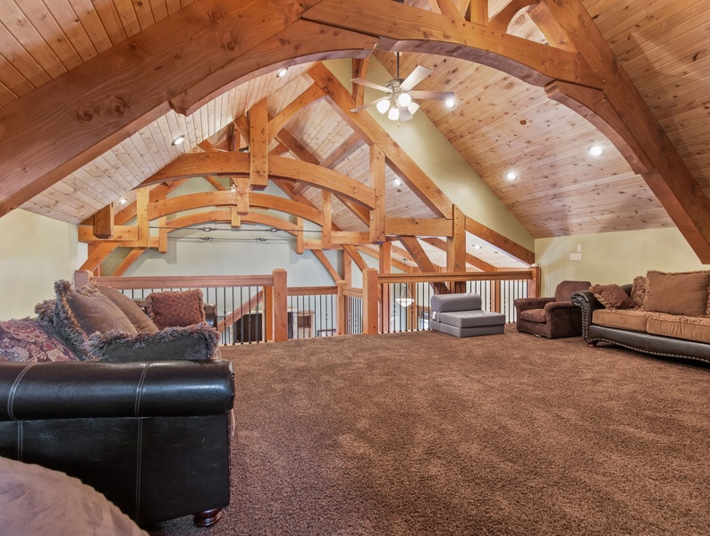 Discover tranquility in our attic, featuring a sumptuously soft and inviting couch, the perfect sanctuary to relax and unwind