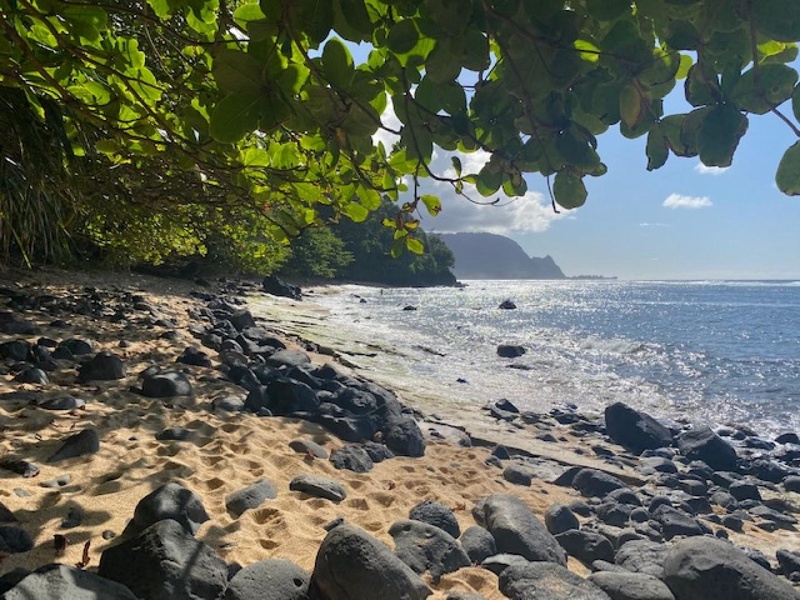 Secluded cove with epic snorkeling and sunsets, ideal for romantic strolls or morning swims.*