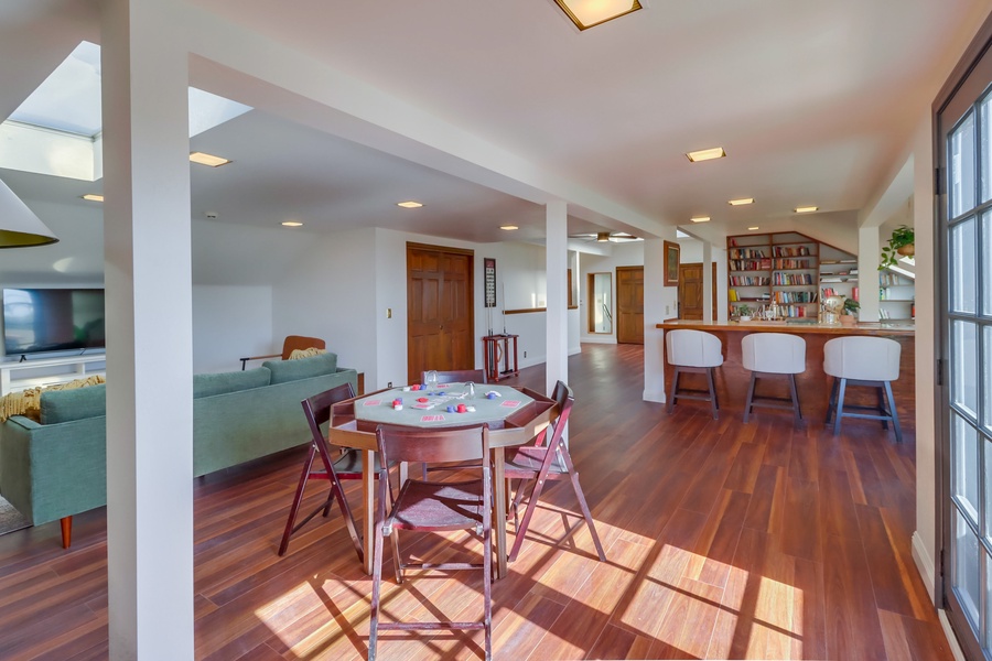 Seamless flow in the family den's open floor space.