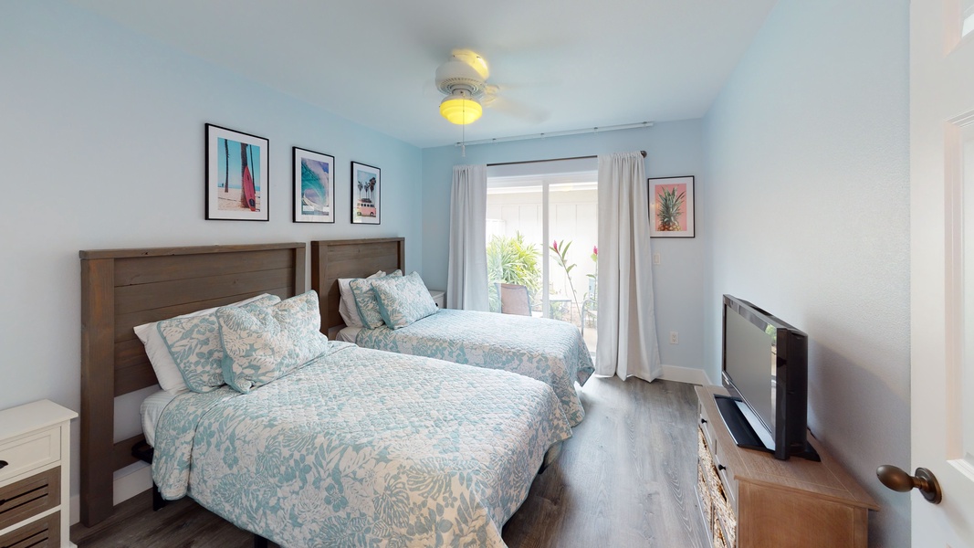 Enjoy a movie night and island breezes in the second guest bedroom.