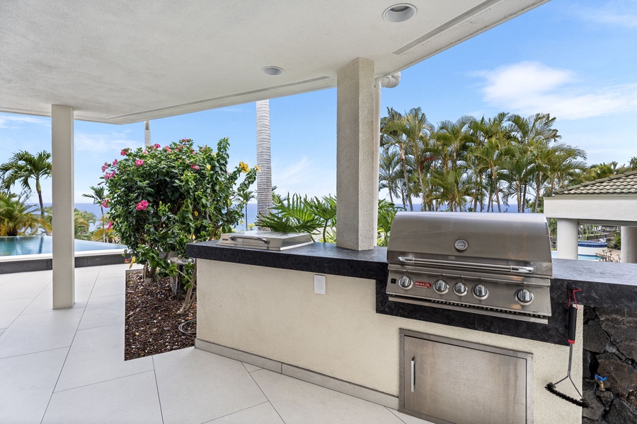 Fire up the built-in BBQ grill and dine in tropical luxury, surrounded by island blooms and salt-kissed air.
