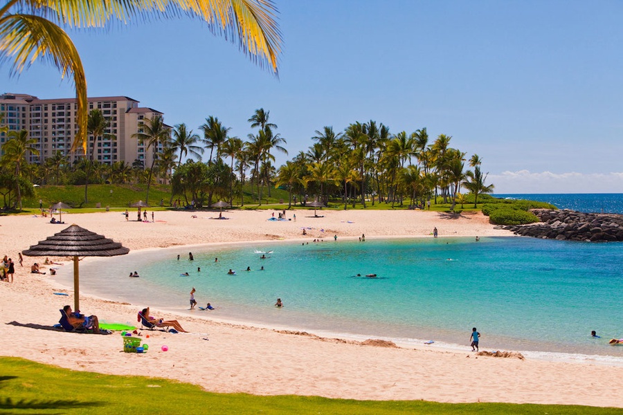 Relax on the pristine beach at nearby Ko Olina resort with crystal-clear turquoise waters, swaying palm trees, and soft white sand beaches.