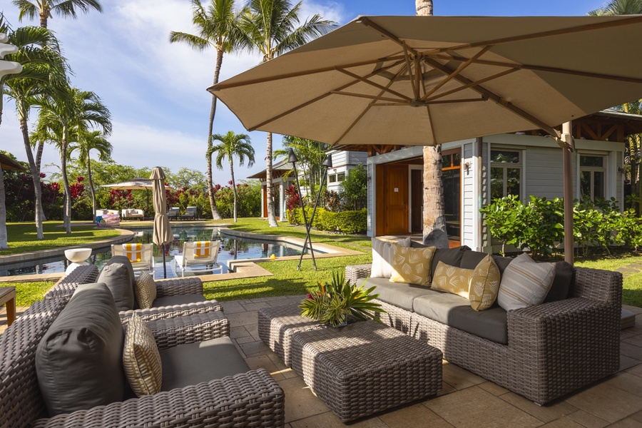 Enjoy the outdoor lanai seating, a perfect spot to gather, dine, and relax.