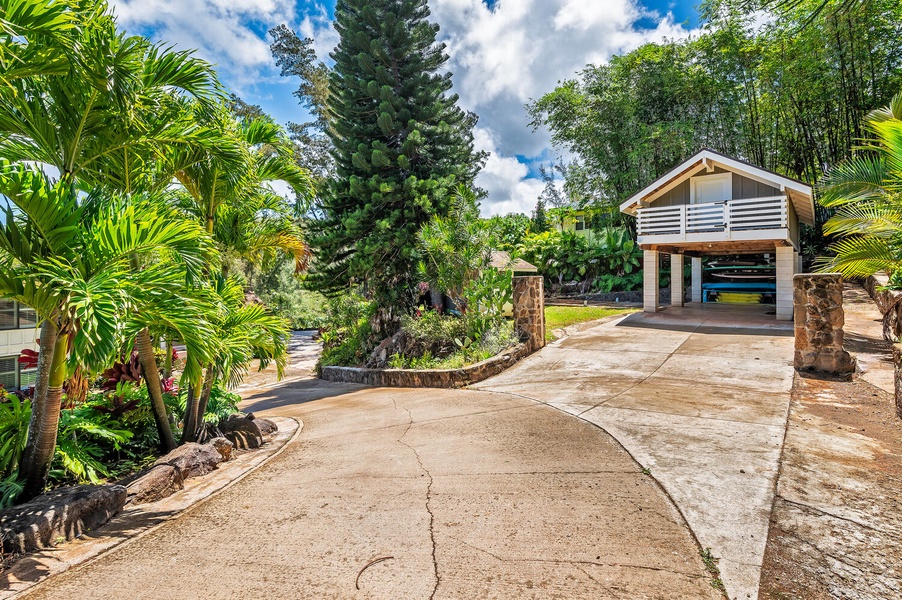 Head up the driveway to the covered carport