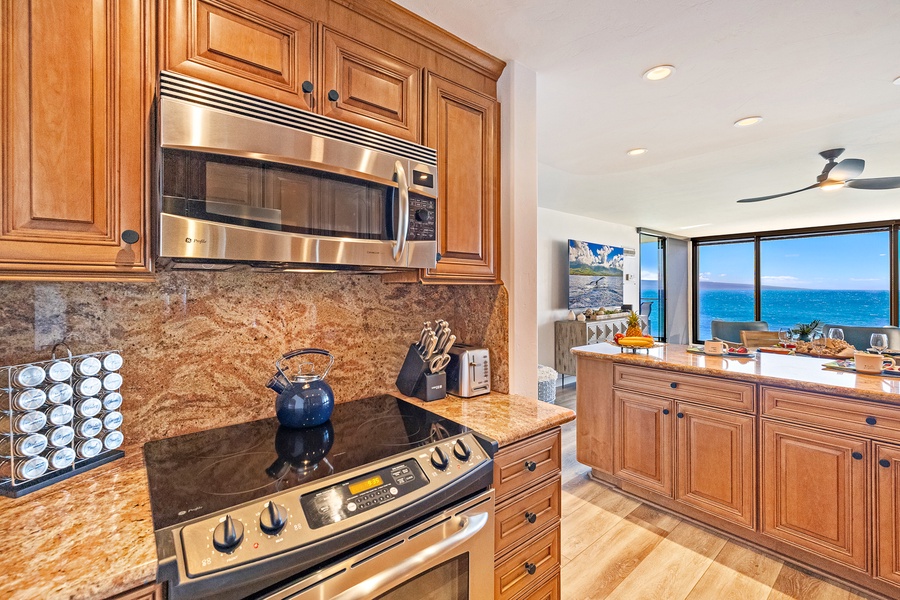 At Mahana 1118, prepare meals in a fully equipped kitchen with stunning ocean views.