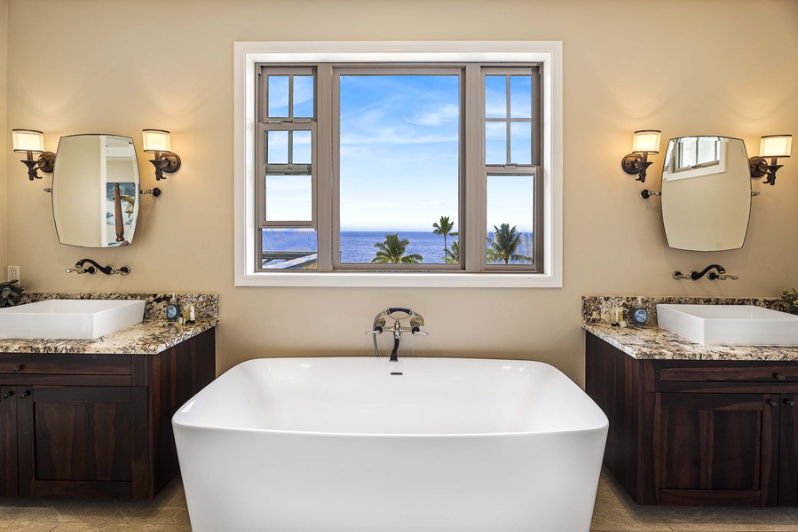Soak in the free standing tub while watching the ocean