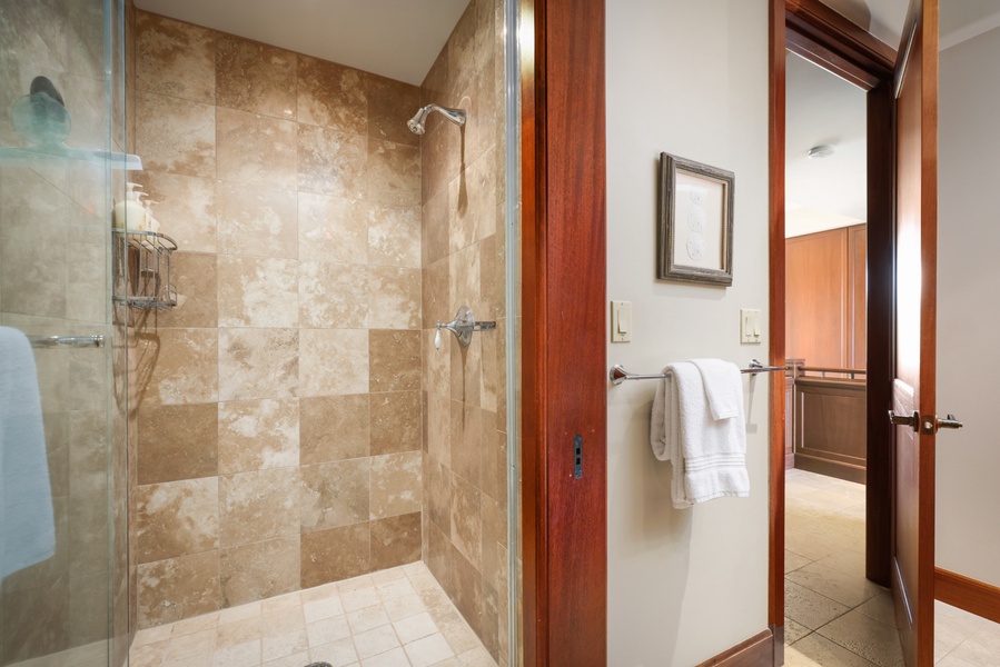 Tiled walk-in shower in Guest Room #3 bath.