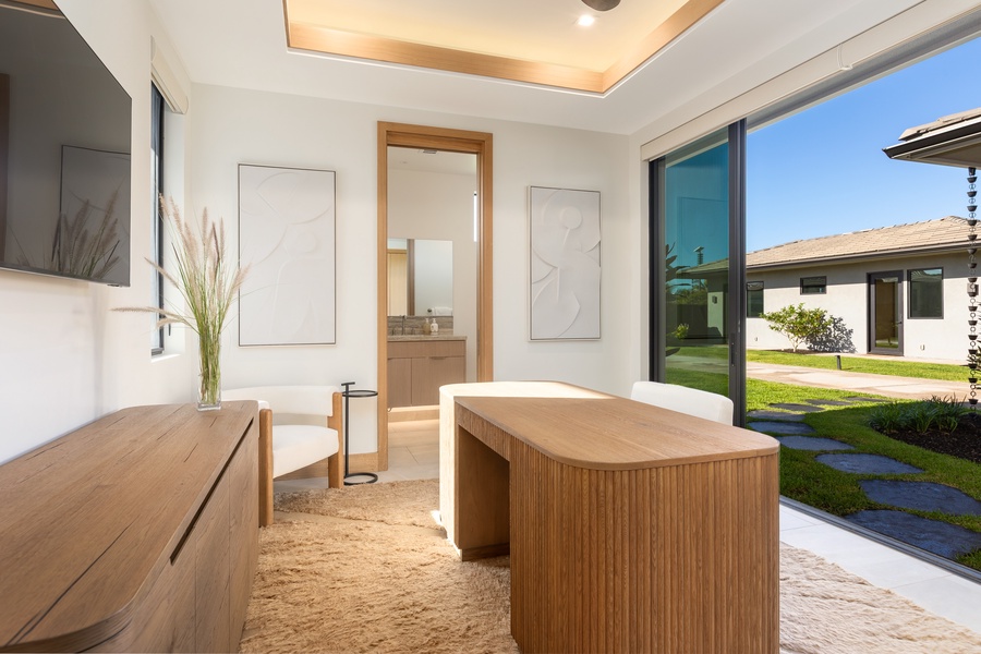 Soak in your private wooden tub surrounded by elegant marble and warm wood tones while natural light streams through floor-to-ceiling windows.