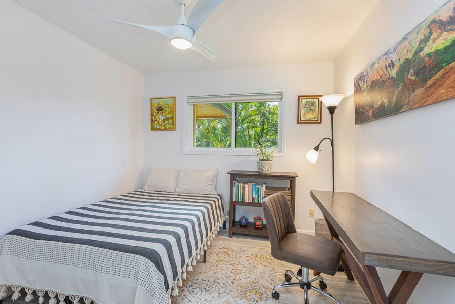 Third bedroom with double bed, Central A/C, and desk setup —great for remote work or reading.