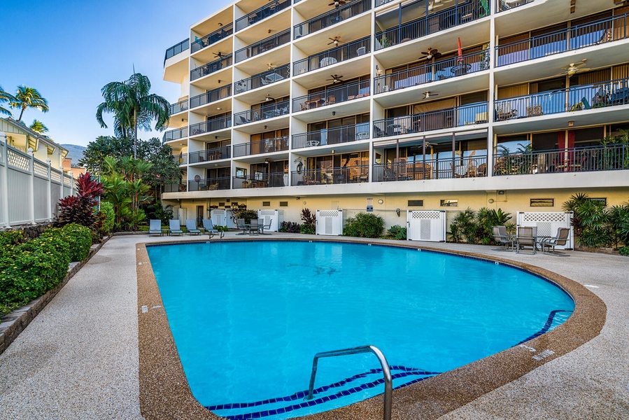 Kona Alii's pool with poolside loungers.