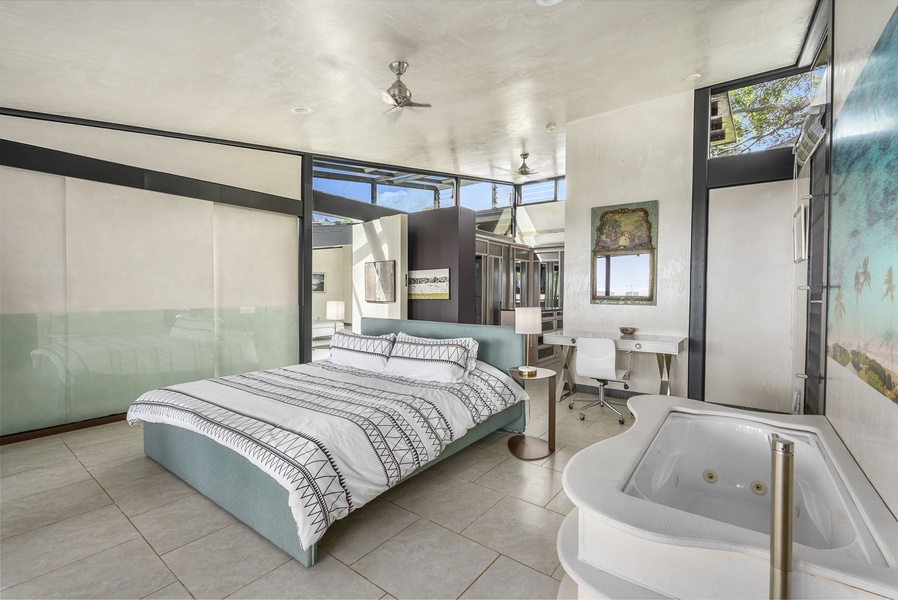 The primary suite offers an open layout with stunning views and a spa-like ensuite.