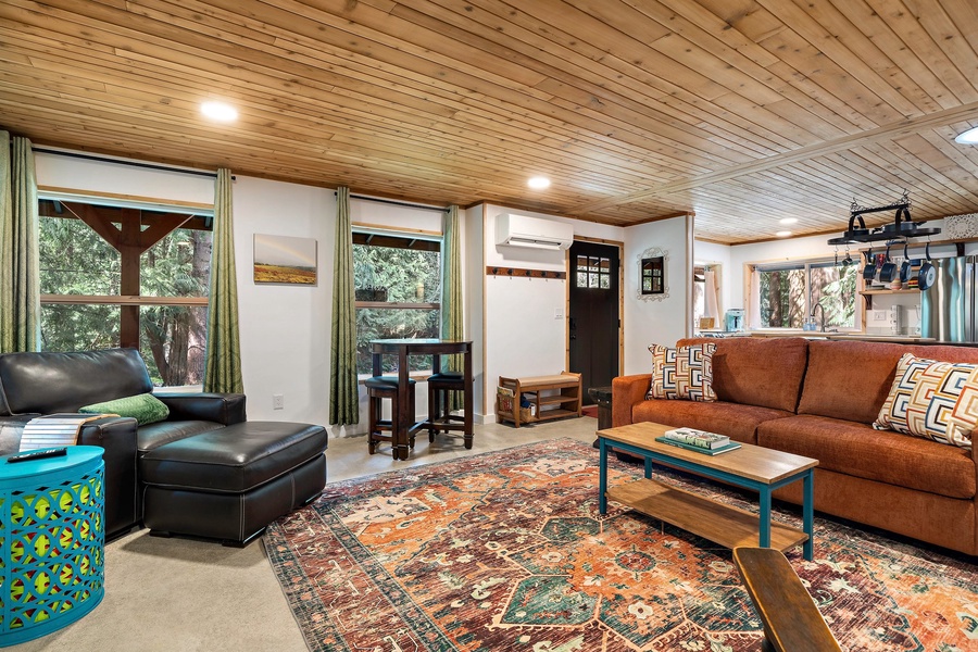 Large windows frame lush greenery, connecting you to nature even while indoors.