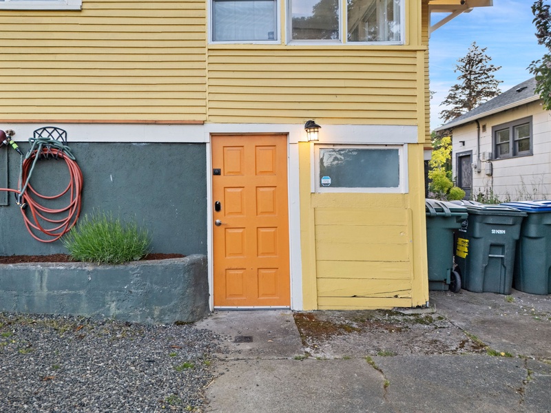 Enter through your private side entrance with convenient access to the home and parking.