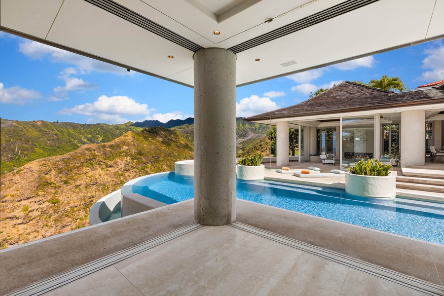 A Hilltop Oasis with Panoramic Mountain Views.