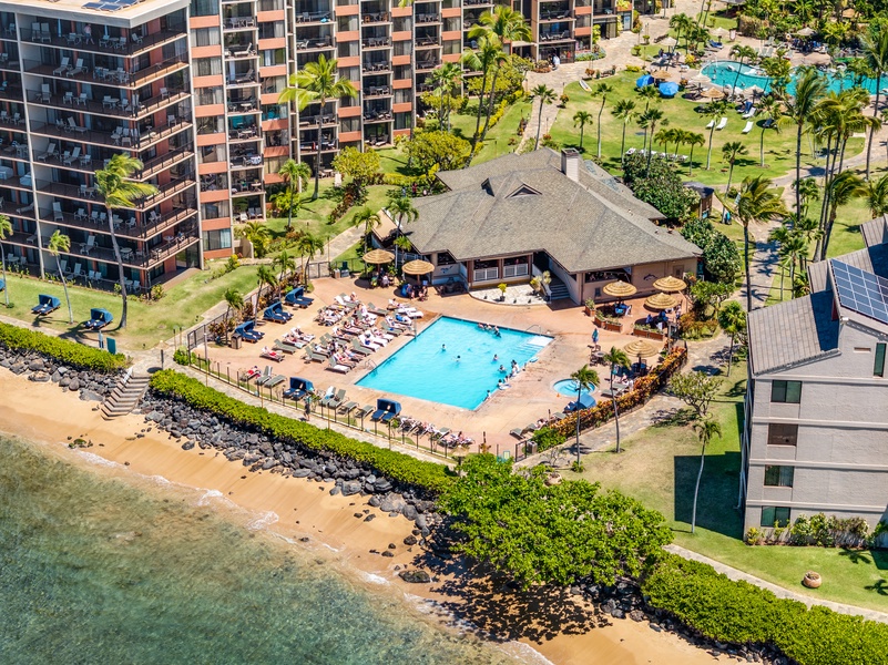 Aerial view of the shorefront pool at Kaanapali Shores with direct beach access.